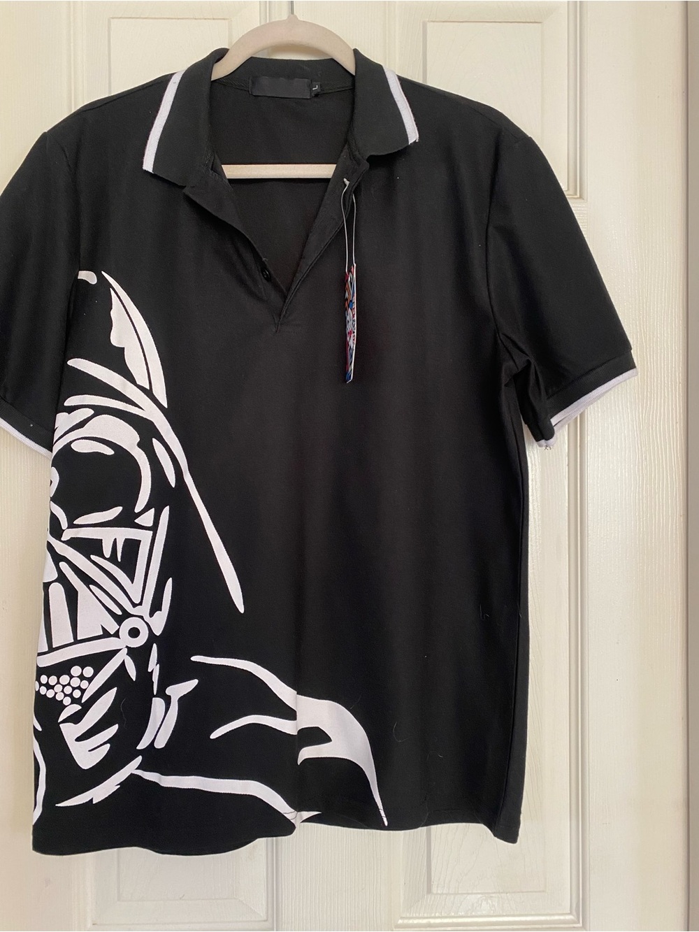 Black Graphic Short-Sleeve Polo Shirt - White Accent